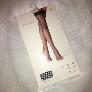 1 pair of black fishnet thigh highs